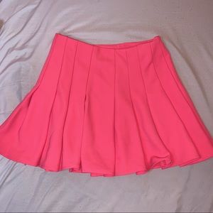 pink pleated mini skirt